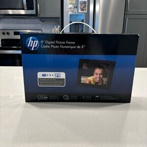 HP 8 inch digital picture frame. Black. Never used!